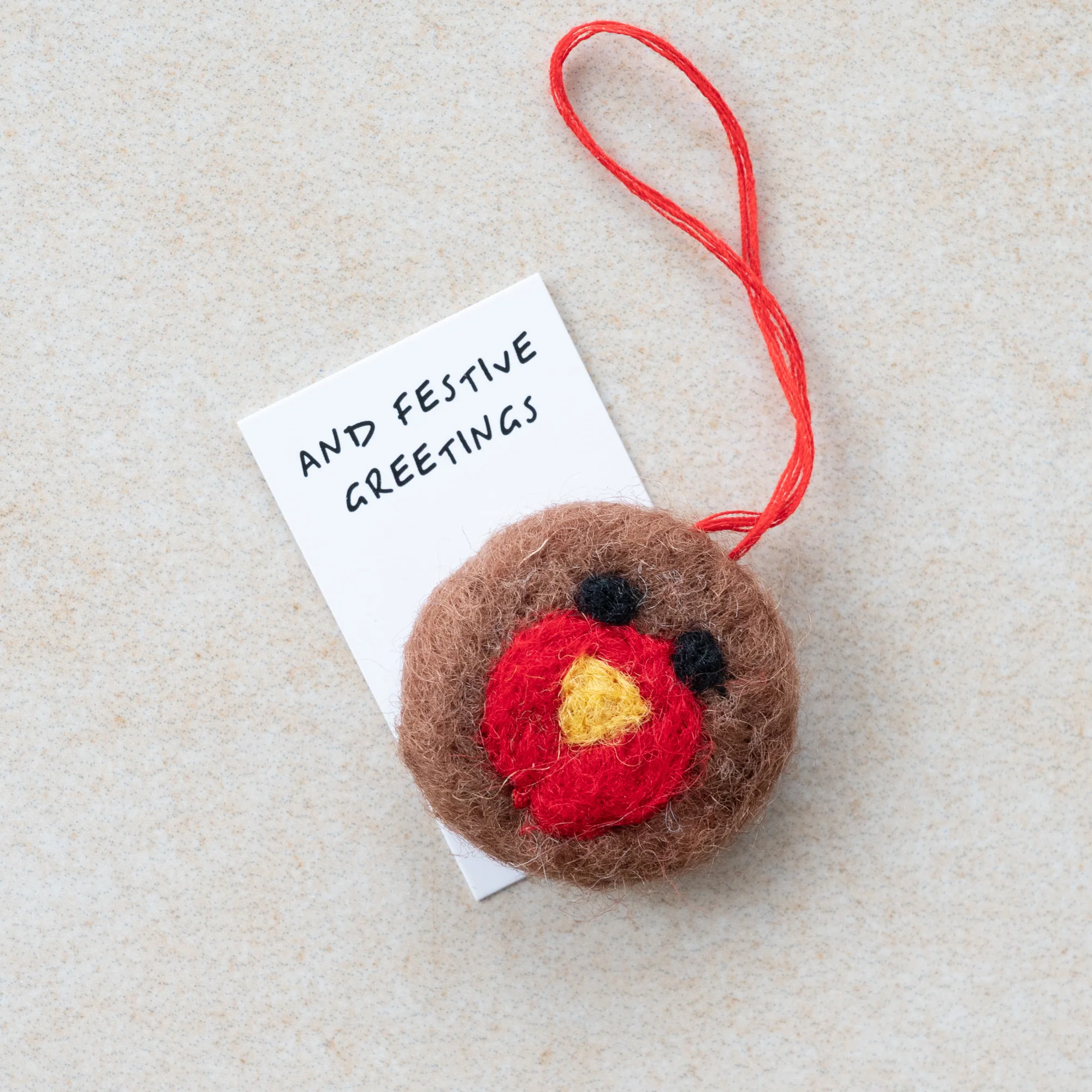Seasons Greetings wool felt bauble - Image 4